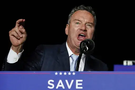 Wisconsin Republican gubernatorial candidate Tim Michels speaks as he appears with former President Donald Trump at a rally in Waukesha, Wis., on Aug. 5, 2022. The Republican running for governor in swing state Wisconsin suggested Tuesday, Oct. 18, 2022, that he would not enforce the state's near-total ban on abortions, saying “I will never arrest a doctor.” (AP Photo/Morry Gash, File)