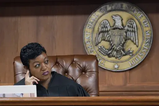 Hinds County Chancery Judge Crystal Wise Martin listens to lawyer Rob McDuff, an attorney for Parents For Public Schools, during a hearing in Jackson, Miss., Aug. 23, 2022. (AP Photo/Rogelio V. Solis, File)
