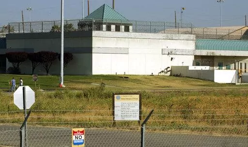 The Federal Correctional Institution is shown in Dublin, Calif., July 20, 2006. For months, inmates and staff say, their calls for help were ignored. And in this aging prison of deep despair — a place where sexual abuse has been rampant, authorities acted with utter indifference and the work force was deeply demoralized — the cries for help had been many and varied.  (AP Photo/Ben Margot, File)