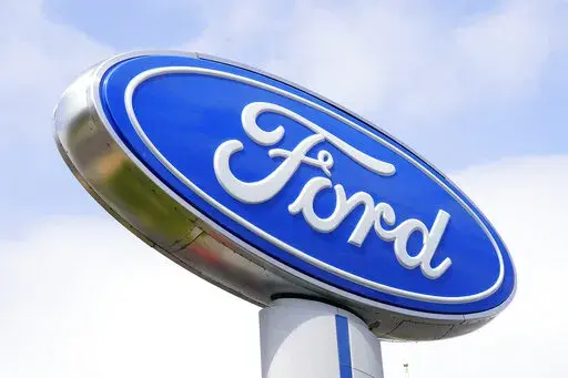 A Ford dealership in Springfield, Pa., Tuesday, April 26, 2022. Ford Motor Co. is recalling more than a quarter-million Explorer SUVs in the U.S., Friday, April 29,  because they can roll away unexpectedly while shifted into park. The recall covers certain 2020 through 2022 Explorers with 2.3-liter engines, as well as 3-liter and 3.3-liter hybrids and the 3-liter ST.   (AP Photo/Matt Rourke, File)