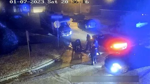 In this image from video released and partially redacted by the city of Memphis, Tenn., Tyre Nichols lies on the ground during a brutal attack by Memphis Police officers on Jan. 7, 2023, in Memphis. Officials said Tuesday, Feb. 7, that a total of 13 Memphis officers could end up being disciplined in connection with the violent arrest of Nichols, as city council members expressed frustration with the city’s police and fire chiefs during a meeting for not moving quickly on specific policy reform