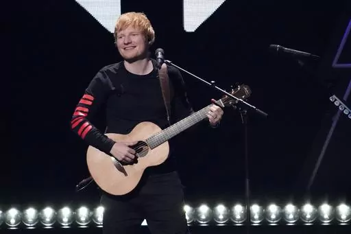 Ed Sheeran performs at Z100's iHeartRadio Jingle Ball on Dec. 10, 2021, in New York. Jury selection and opening statements are expected to begin Monday, April 24, 2023, in a trial that mashes up Ed Sheeran's “Thinking Out Loud” with Marvin Gaye's “Let's Get It On.” (Photo by Charles Sykes/Invision/AP, File)