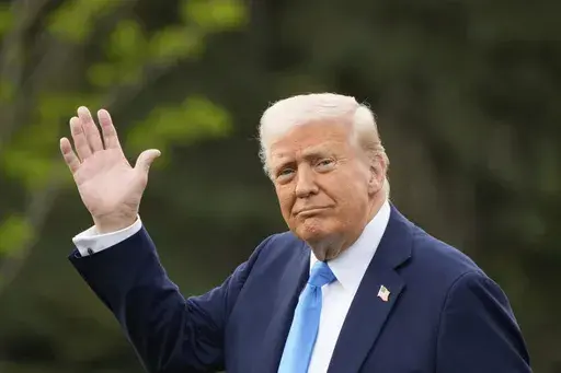 President Donald Trump walks from the Oval Office to board Marine One on the South Lawn of the White House en route to Florida, Friday, March 28, 2025, in Washington. (AP Photo/Mark Schiefelbein)