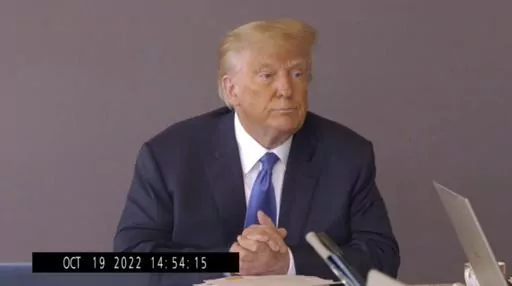 In this image taken from video released by Kaplan Hecker & Fink, former President Donald pauses during his Oct. 19, 2022, deposition for his trial against writer E. Jean Carroll. The video recording of Trump being questioned about the rape allegations against him was made public for the first time Friday, May 5, 2023, providing a glimpse of the Republican's emphatic, often colorful denials. (Kaplan Hecker & Fink via AP)
