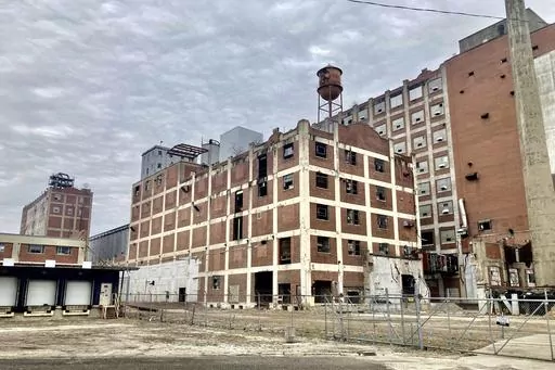 The hulking former Pillsbury Mills plant in Springfield, Ill., is seen, Dec. 30, 2022. It presents a challenge for the citizen nonprofit organization, Moving Pillsbury Forward, but the group has collected $6 million in commitments and has a road map for securing the balance of the $10 million it says it needs to demolish the 500,000 square feet of former factory before redeveloping the 18-acre site. The mill operated under Minneapolis-based Pillsbury and another owner for 71 years but has been v