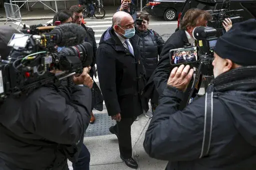 Trump Organization's former Chief Financial Officer Allen Weisselberg, center, arrives to court on Nov. 15, 2022, in New York. Closing arguments are slated for Thursday, Dec. 1, in Donald Trump's company’s criminal tax fraud case. Prosecutors and defense lawyers say those could take seven hours or more. Those projections speak to the complexity of the case, which stems from longtime Trump Organization finance chief Weisselberg's 15-year scheme to avoid taxes on company-paid perks including an 