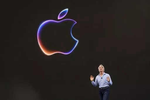 Craig Federighi, Apple's senior vice president of software engineering, speaks during an announcement of new products at the Apple campus in Cupertino, Calif., on Monday, June 10, 2024. (AP Photo/Jeff Chiu)
