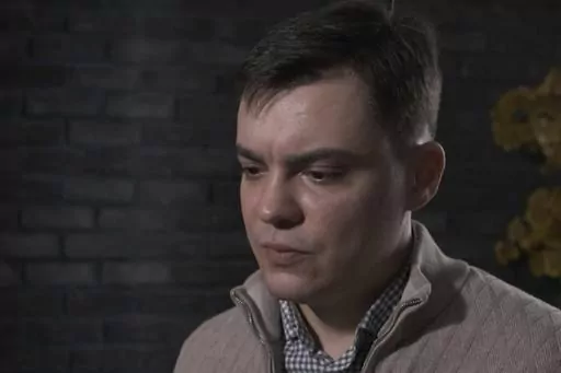 In this image from video provided by the Dossier Center, a London-based investigative group funded by Russian opposition figure Mikhail Khodorkovsky, Gleb Karakulov speaks during an interview in Turkey in December 2022. Karakulov was an officer in President Vladimir Putin’s secretive elite personal security service - one of the few Russians to flee and go public who have rank, as well as knowledge of intimate details of Putin’s life and potentially classified information. (Dossier Center via