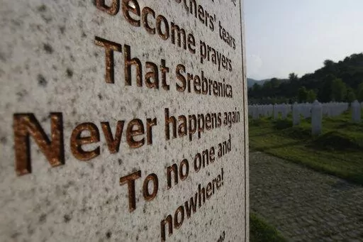A gravestone in memory of victims of the Srebrenica massacre is seen at the Potocari memorial center near Srebrenica, Bosnia, Thursday, May 26, 2011. Survivors of war crimes committed during Bosnia’s 1992-95 war say the victims of ongoing human rights abuses in Ukraine should learn from their experience of fighting for justice, but that they must first make peace with the fact that reaching it will inevitably be a lengthy and painful process. (AP Photo/Amel Emric, File)
