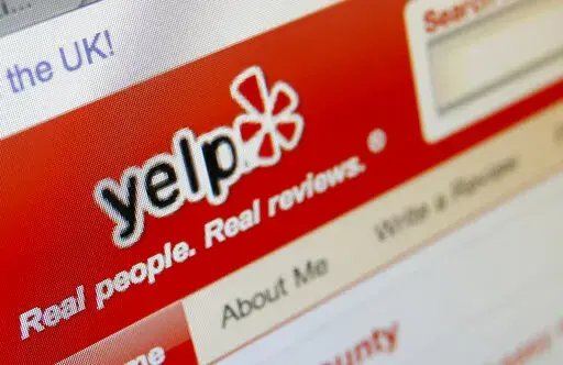 The Yelp website is shown on a computer screen in Los Angeles, March 17, 2010. The online reviews site Yelp said Tuesday, Aug. 23, 2022, that it is rolling out a new feature to protect users seeking abortions from being misled about anti-abortion centers listed on its platform. (AP Photo/Richard Vogel, File)