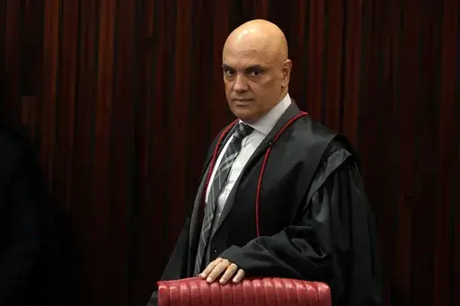 Brazilian Supreme Court Chief Justice Alexandre de Moraes arrives for a court hearing, in Brasilia, Brazil, June 22, 2023. (AP Photo/Eraldo Peres, File)