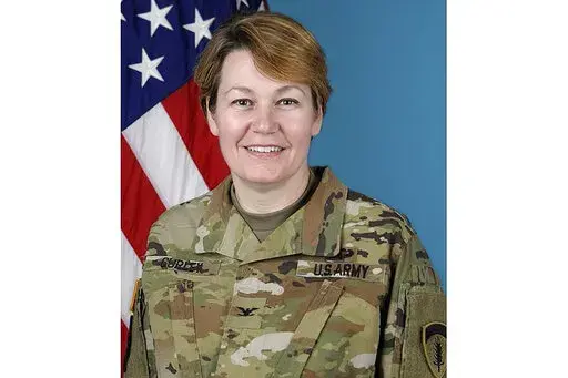 This image provided by the U.S. Army shows Col. Gail Curley.  When Gail Curley began her job as Marshal of the U.S. Supreme Court less than a year ago, she would have expected to work mostly behind the scenes: overseeing the court’s police force and the operations of the marble-columned building where the justices work. Earlier this month, however, Curley was handed a bombshell of an assignment, overseeing an investigation into the leak of a draft opinion and apparent votes in a major abortion