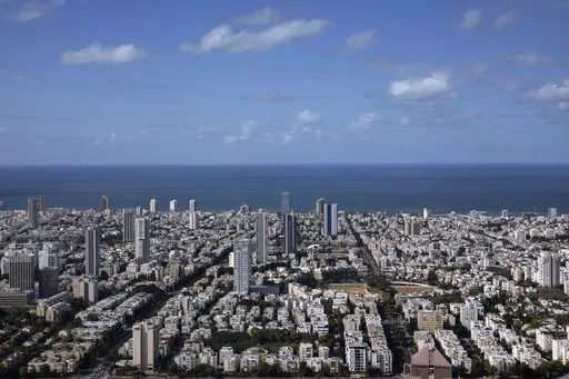 A general view shows the center of Tel Aviv, Israel, Thursday, Dec. 2, 2021. Prime Minister Benjamin Netanyahu has vowed to shut down Al Jazeera’s operations in Israel, calling it a “terror channel” that spreads incitement, after parliament passed a law clearing the way for the closure. (AP Photo/Oded Balilty, File)