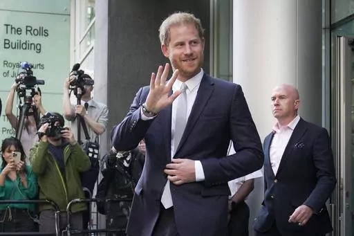 Prince Harry leaves the High Court after giving evidence in London, Wednesday, June 7, 2023. A London judge has allowed Prince Harry's lawsuit against the publisher of The Sun tabloid to go to trial on claims the newspaper used unlawful methods to gather information about him. (AP Photo/Kin Cheung, File)