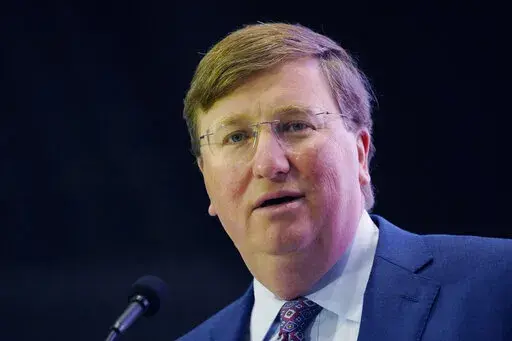 Mississippi Gov. Tate Reeves addresses business leaders at the Mississippi Economic Council's annual "Hobnob Mississippi" in Jackson, Miss., Thursday, Oct. 27, 2022. Reeves expressed a desire for the elimination of the state's income tax during his address. (AP Photo/Rogelio V. Solis)
