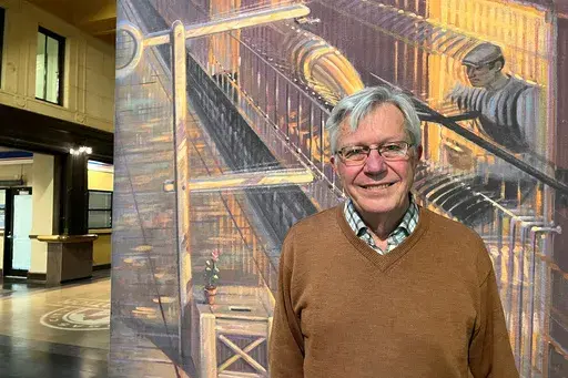 Don Herneisen, a 77-year-old retired school counselor from Lancaster, Pennsylvania, spoke in Union Station in Kansas City, Missouri, while visiting family in the area. (AP Photo/Heather Hollingsworth)