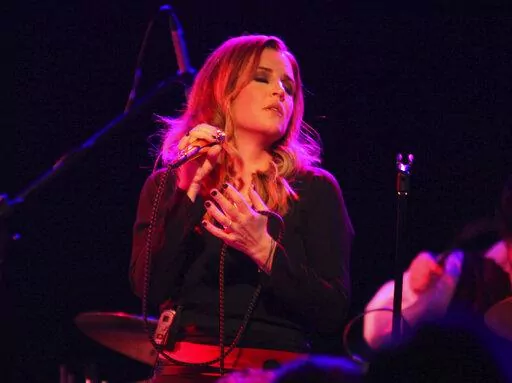 Lisa Marie Presley performs during her Storm & Grace tour on June 20, 2012, at the Bottom Lounge in Chicago. Presley — the only child of Elvis Presley and a singer herself — was hospitalized Thursday, Jan. 12, 2023, her mother said in a statement. (Photo by Barry Brecheisen/Invision/AP, File)