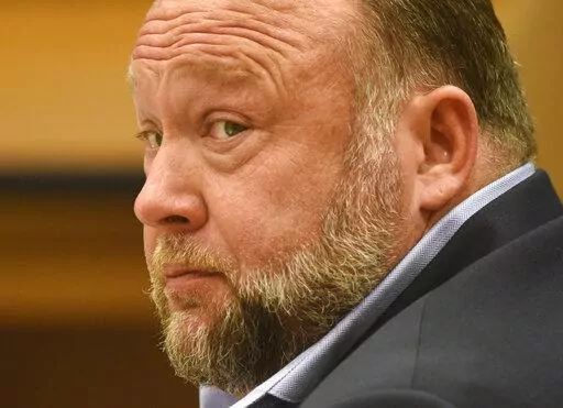 Infowars founder Alex Jones appears in court to testify during the Sandy Hook defamation damages trial at Connecticut Superior Court in Waterbury, Conn., Thursday, Sept. 22, 2022. Jones has filed for personal bankruptcy protection in Texas as he faces nearly $1.5 billion in court judgments over conspiracy theories he spread about the Sandy Hook school massacre. Jones filed for Chapter 11 bankruptcy protection in bankruptcy court in Houston on Friday, Dec. 2. (Tyler Sizemore/Hearst Connecticut Me