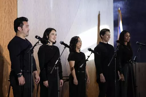 From left, cast members Kenzo Lee, Lillian Mimi McKenzie, Kaitlyn Tanimoto, Victoria Rani, and Kimberly Green perform in "What Do I Do With All This Heritage?" on Wednesday, May 22, 2024, in Los Angeles. The show offers more than 14 true stories of Asian American Jews. (AP Photo/Ashley Landis)