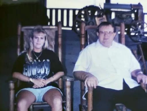 In this photo taken sometime in the early 2000s provided by Kymberly Hobbs, Hobbs poses next to her brother, Charles Givens. The Virginia Department of Corrections, under scrutiny over the death of inmate Givens in a case that has raised wider concerns about conditions at a southwest Virginia prison, is refusing Wednesday, Aug. 9, 2023, to release public records documenting inmate complaints about the facility. (Courtesy of Kymberly Hobbs via AP, File)