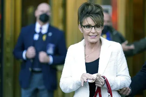 FILE -Sarah Palin leaves the courthouse in New York, Thursday, Feb. 10, 2022. Sarah Palin on Friday, April 1, 2022 shook up an already unpredictable race for Alaska's lone U.S. House seat, filing paperwork to join a field of at least 40 candidates seeking to fill the seat that had been held for 49 years by the late-U.S. Rep. Don Young, who died last month. (AP Photo/Seth Wenig, File)