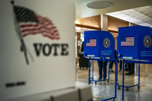 A voting center is pictured during early voting in the states' presidential primary election, March 26, 2024, in Freeport, N.Y. Even before President Joe Biden's withdrawal from the 2024 presidential race, allies of former President Donald Trump floated the possibility of suing to block Democrats from having anyone other than Biden on the ballot in November. But election administration experts say the timing of Biden's exit makes it unlikely that any Republican ballot access challenges will succ