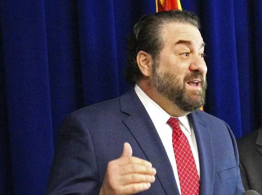 Arizona Attorney General Mark Brnovich speaks at a news conference in Phoenix, on Jan. 7, 2020. Brnovich suppressed findings by his investigators who concluded there was no basis for allegations that the 2020 election was marred by widespread fraud. That's according to documents released Wednesday, Feb. 22, 2023, by his successor, Kris Mayes.(AP Photo/Bob Christie, File)