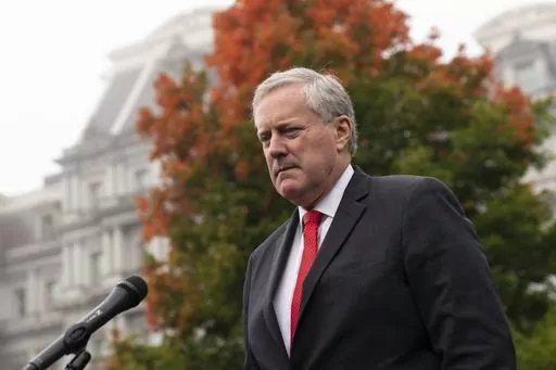 White House chief of staff Mark Meadows speaks with reporters at the White House, Wednesday, Oct. 21, 2020, in Washington. A federal judge in Atlanta is set to hear arguments Monday, Aug. 28, 2023, on whether Mark Meadows should be allowed to fight the Georgia indictment accusing him of participating in an illegal scheme to overturn the 2020 election in federal court rather than in a state court. (AP Photo/Alex Brandon, File)