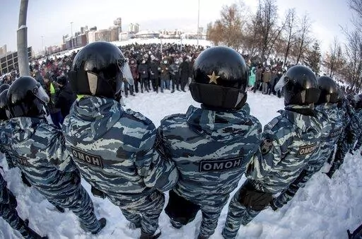 FILE -- Police block a protest against the jailing of opposition leader Alexei Navalny in Yekaterinburg, Russia, Saturday, Jan. 23, 2021. Transparency International’s 2022 Corruption Perceptions Index, which measures the perception of public sector corruption according to experts and businesspeople, reported Tuesday that governments hampered by corruption lack the capacity to protect the people, while public discontent is more likely to turn into violence. (AP Photo/Anton Basanayev, file)
