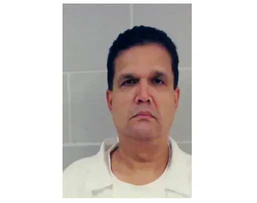 This undated photo provided by the U.S. Marshals Service shows Leonard Francis. The Malaysian defense contractor nicknamed “Fat Leonard," who orchestrated one of the largest bribery scandals in U.S. military history, has been arrested in Venezuela after fleeing before his sentencing, authorities said Wednesday, Sept. 21, 2022. (Courtesy of U.S. Marshals Service via AP, File)