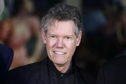 Randy Travis attends the announcement of the Country Music Hall of Fame inductees in Nashville, Tenn., on March 29, 2016. (AP Photo/Mark Humphrey, File)
