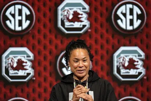 South Carolina head coach Dawn Staley speaks during NCAA women's college basketball Southeastern Conference Media Day, Wednesday, Oct. 16, 2024, in Birmingham, Ala. (AP Photo/Mike Stewart)