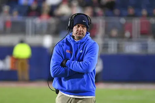 Mississippi head coach Lane Kiffin watches on during the second half of an NCAA college football game against Vanderbilt in Oxford, Miss., Saturday, Nov. 20, 2021. No. 10 Mississippi won 31-17. (AP Photo/Thomas Graning)