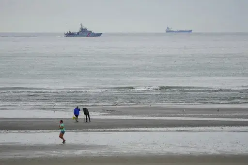 A vessel of the French Gendarmerie Nationale patrols in front of the Wimereux beach, France, Wednesday, Sept. 4, 2024. (AP Photo/Nicholas Garriga, File)