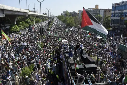 Thousands of supporters of the religious party Tehreek-e-Labbaik Pakistan (TLP) take part in a rally in solidarity with Palestinian people in Gaza, in Rawalpindi, Pakistan, Saturday, July 13, 2024. (AP Photo/W.K. Yousafzai)