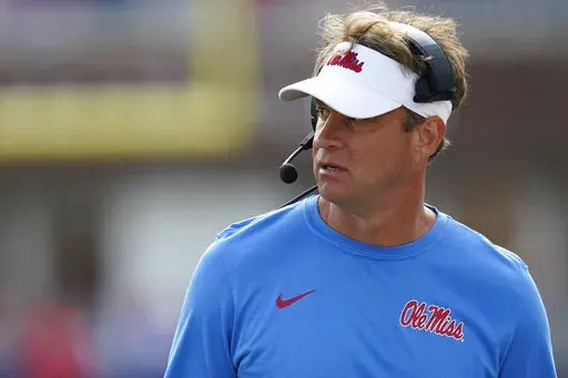 FILE - Mississippi head coach Lane Kiffin looks on as his team plays against Liberty during the second half of an NCAA college football game in Oxford, Miss., Saturday, Nov. 6, 2021.  The Southeastern Conference's most prolific offense clashes with one of the better defenses in the Big 12 when No. 8 Mississippi meets sixth-ranked Baylor in the Sugar Bowl.  (AP Photo/Rogelio V. Solis, File)