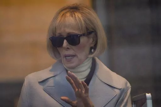 E. Jean Carroll arrives at Manhattan federal court, Wednesday, Jan. 17, 2024, in New York. Less than a year after convincing a jury that former President Donald Trump sexually abused her decades ago, writer E. Jean Carroll is set to take the stand again to describe how his verbal attacks affected her after she came forward. (AP Photo/Eduardo Munoz Alvarez)
