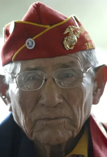 Navajo Code Talker John Kinsel Sr., of Lukachukai, Ariz., listens as his comrades speak of their WWII experiences Tuesday Aug. 14, 2007, in Window Rock, Ariz. (AP Photo/Donovan Quintero, File)