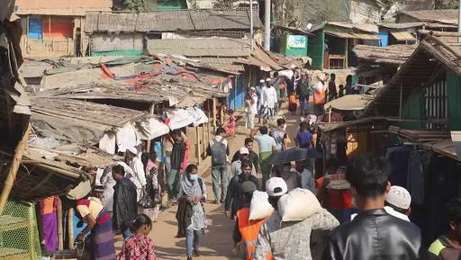 In this image from a video, Rohingya refugees walk at the Balukhali refugee camp in Cox's Bazar, Bangladesh, Feb. 2, 2021. A powerful ethnic armed group fighting Myanmar’s military government in the country’s western state of Rakhine claimed Saturday, May 18, 2024, to have seized a town near the border with Bangladesh, marking the latest in a series of victories for foes of the country’s military government. The state’s Muslim Rohingyas, targets of deadly army-directed violence in 2017, 