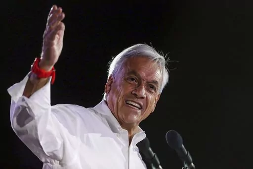 Sebastian Pinera, former Chilean president who is running again for office, addresses supporters at his closing campaign rally in Santiago, Chile, Nov. 16, 2017. Piñera died on Tuesday, Feb. 6, 2024 in a helicopter crash in Lago Ranco, Chile, according to Chilean Interior Minister Carolina Tohá who announced it on live TV. (AP Photo/Luis Hidalgo, File)