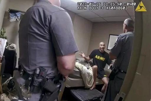 In this image taken from New York State Police body camera video that was obtained by WMTW-TV 8 in Portland, Maine, New York State police interview Army Reservist Robert Card, the man responsible for Maine's deadliest mass shooting, at Camp Smith in Cortlandt, New York on July 16, 2023. Army officials will testify Thursday, March 7, 2024 before a special commission investigating the deadliest mass shooting in Maine history, which was committed by a former reservist. (WMTW-TV 8/New York State pol