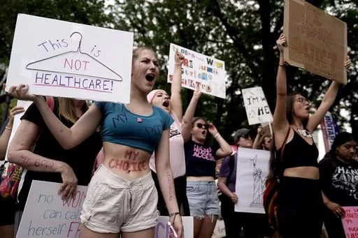 People rally in support of abortion rights, July 2, 2022, in Kansas City, Mo. Legislative efforts in Missouri and Mississippi this week are attempting to prevent voters from having a say over abortion rights, building on anti-abortion strategies seen in other states, including last year in Ohio. (AP Photo/Charlie Riedel, File)