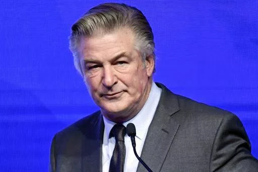 Alec Baldwin emcees the Robert F. Kennedy Human Rights Ripple of Hope Award Gala at New York Hilton Midtown on Dec. 9, 2021, in New York. On Friday, May 24, 2024, a New Mexico judge rejected a request by Baldwin to dismiss the sole criminal charge against him in a fatal shooting on the set of “Rust,” keeping the case on track for a trial this summer. (Photo by Evan Agostini/Invision/AP, File)