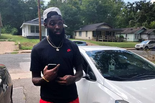 Marcus Cash, 28, speaks during an interview outside a home where his close friend and business partner, Dewayne Tunstall, was fatally shot, in Memphis, Tenn., on Thursday, Sept. 8, 2022. Just before 1 a.m. Wednesday, at least three witnesses saw Ezekiel Kelly fatally shoot Tunstall in the head, according to a police affidavit. It said Kelly pulled Tunstall to the side, then during their conversation drew a handgun and fired several shots. “What did he do to deserve that?” Cash said. (AP Phot