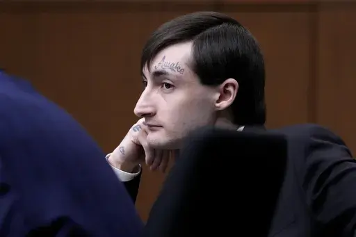 Robert E. Crimo III., watches the jury selection process during the first day of his trial at the Lake County Courthouse, Waukegan, Ill., Monday, Feb. 24, 2025. (AP Photo/Nam Y. Huh, Pool)