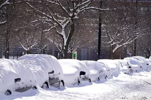 Cars parked for several days Tuesday, Feb. 16, 2021, are covered in cumulative snow in Chicago, the morning after a snowstorm dumped up to 18 inches in the greater Chicago area. Storing a vehicle because it’s not needed is something that an owner might have to do at some point. It might be because it’s a sports car that the owner wants to protect from wintertime driving, or perhaps a vehicle that won’t be driven for months because of a vacation or military deployment. Whatever the reason, 
