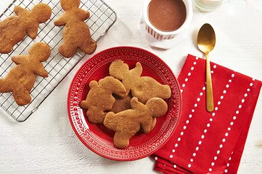 This Nov. 13, 2020 photo shows a display of gingerbread cookies in New York.  The holiday cookie swap is an evergreen tradition that lets you share sweetness, celebrate community and lighten the holiday baking load. (Cheyenne M. Cohen via AP)