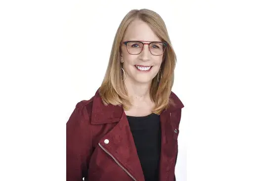 This undated file photo provided by NerdWallet shows Liz Weston, a columnist for personal finance website NerdWallet.com. Extended time off from work doesn’t have to wait until retirement. Your career break may be aspirational, or it may be prompted by life events. Whatever the purpose, careful planning before you take the break can help make it more successful and fulfilling.(NerdWallet via AP, File)