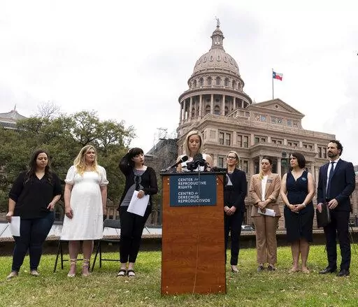 Amanda Zurawski, one of five plaintiffs in Zurawski v. State of Texas, speaks in front of the Texas State Capitol in Austin, Texas, Tuesday, March 7, 2023, as the Center for Reproductive Rights and the plaintiffs announced their lawsuit, which asks for clarity in Texas law as to when abortions can be provided under the "medical emergency" exception. All five women were denied medical care while experiencing pregnancy complications that threatened their health and lives. (Sara Diggins/Austin Amer