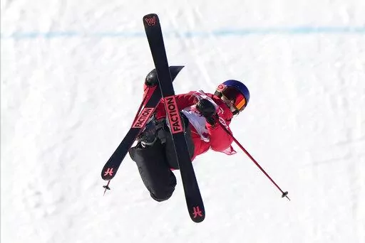 China's Eileen Gu competes during the women's slopestyle qualification at the 2022 Winter Olympics, Monday, Feb. 14, 2022, in Zhangjiakou, China. (AP Photo/Francisco Seco)
